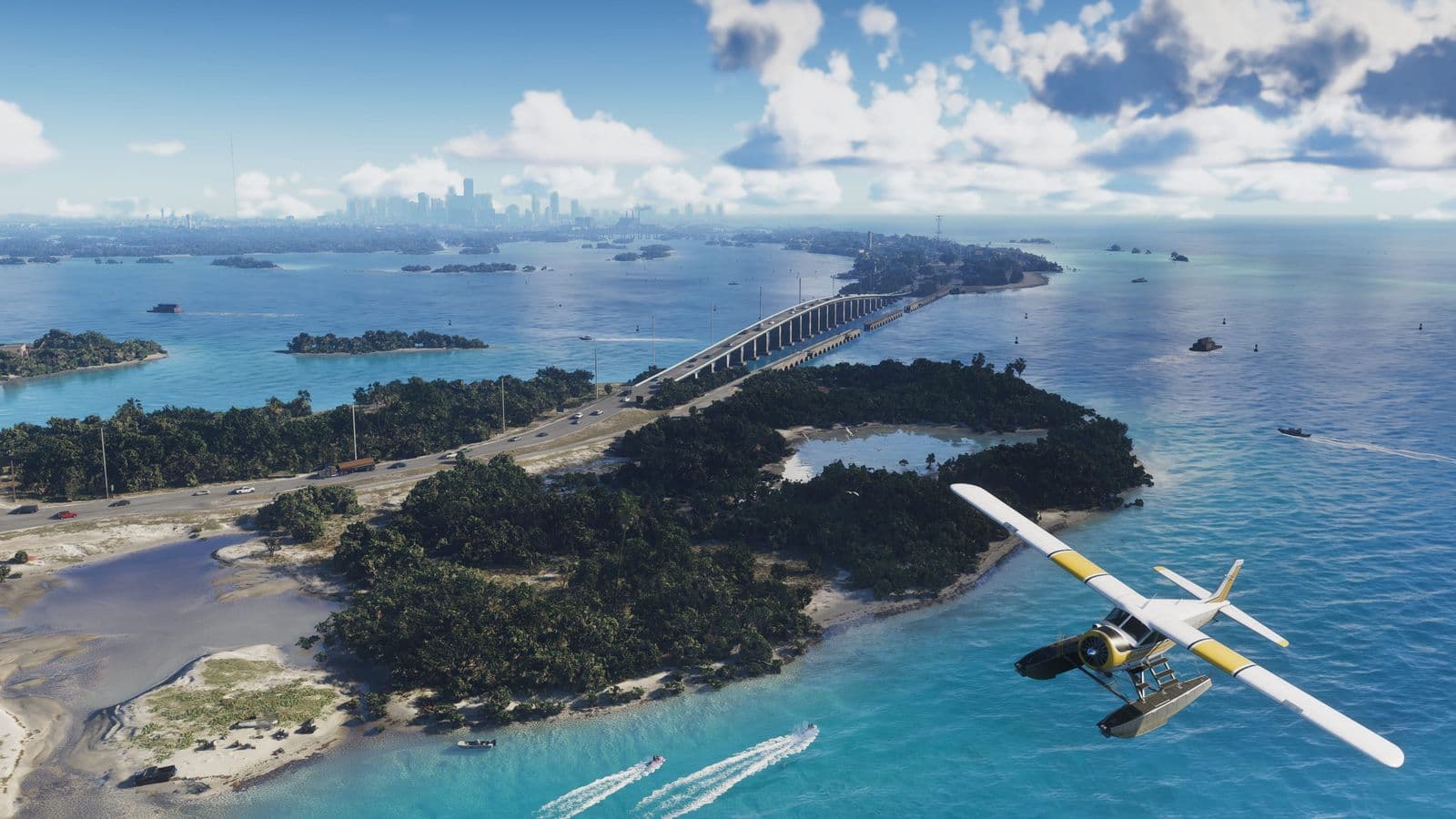 Aerial view of the Leonida Keys: wooded islands, a long bridge and a seaplane over turquoise water