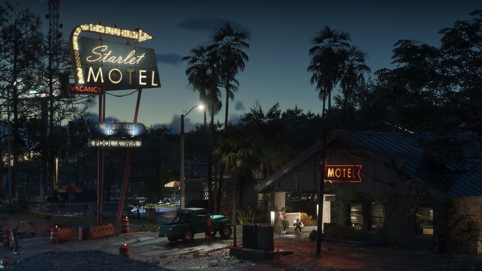The Starlet Motel in Port Gellhorn at dusk, its vacancy sign lit